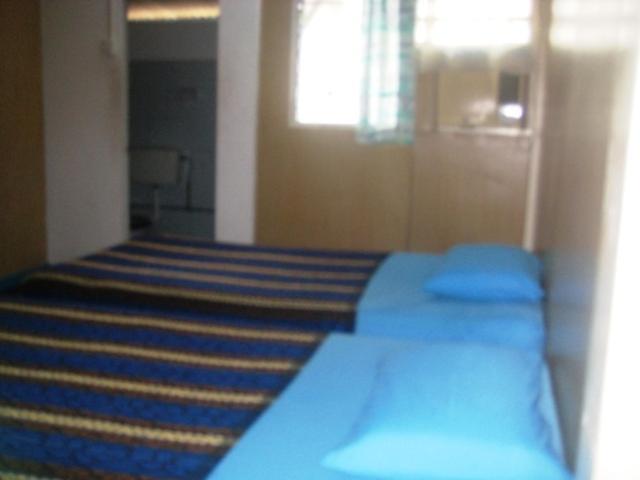 Et Budget Guest House Batu Feringgi Kamer foto