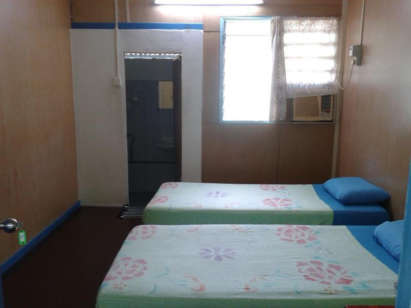 Et Budget Guest House Batu Feringgi Buitenkant foto
