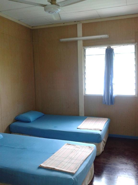 Et Budget Guest House Batu Feringgi Kamer foto
